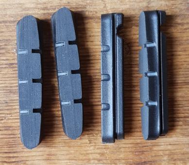 Bremsklötze für 90er J. Rennradklassiker,  SHIMANO,  Satz 4 Stück, schwarz, passend f. Schuh ca. 55 x 9 mm    