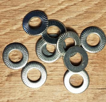 Unterlegscheibe für Nabe mit max. 9 mm Achse, einseitig geriffelt für besseren Halt, verzinkt, D: 17,5 / 9 mm, 1 Stück    