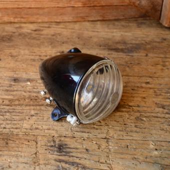 Scheinwerfer "Lohmann S57" Stromlinienform, alte Neuware 